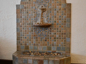 The Heritage Funeral Homes, Suminski/Weiss Chapel has another original fountain with tiles from the Batchelder Wilson-Tile Co., built in 1926.