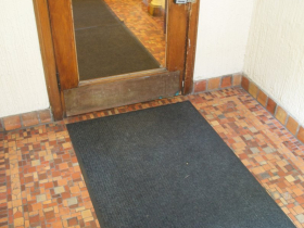 Deco tiles are plentiful in the flooring of the two Humboldt apartment buildings