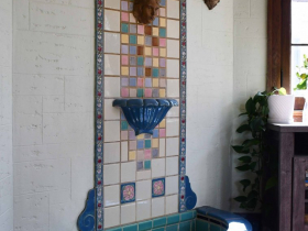 A rare and colorful fountain with tiles from the Claycraft Tile Co. and a Batchelder spout, built in 1928.