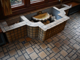 A fish pond with tiles from the Flint Faience Tile Co. and a Batchelder spout located in a home designed by architect George Zagel in 1924.
