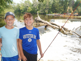 Will Gee, 11 (left) and Max Joyce, 11 (right) go fishing in the Milwaukee River near Kletzsch Dam two or three days a week during the summer. They typically fish for largemouth or smallmouth bass. 