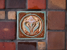 Detail of a Continental Faience & Tile Co. insert inside an apartment on S 13th St.