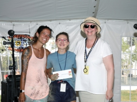 Chalk artist winners Kimberly Wood and Kaylee Goodman with Laurie Winters