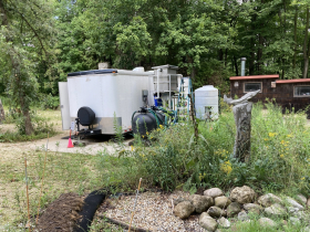 The Streamside Rearing Facility at Riveredge in Newburg, Wisconsin consists of a trailer connected to constantly circulating water pumped up from the Milwaukee River