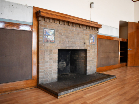Fireplace with two tiled panels