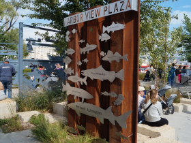 The largest sponsorship credit for Harbor View Plaza is denoted with a sturgeon