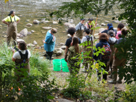 Glen Hills teacher Lalitha Murali joins her students in waders for the Kletzsch field experience
