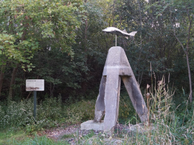 A silver sturgeon statue adorns a relic of the former Estabrook Dam along the west bank of the Milwaukee River