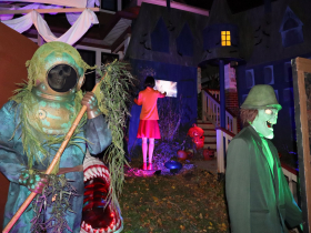 Velma in the background at A&J's Halloween House Scooby-Doo Theme