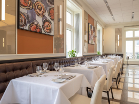 Bacchus, a Bartolotta restaurant, main dining room with wall art