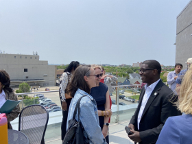 County Executive David Crowley speaks with Milwaukee County Comptroller Liz Sumner at the grand opening celebration for Marcia P. Coggs Human Services building