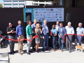 Mayor Cavalier Johnson cuts ribbon on Downtown Dog Park. 