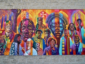 Brad Bernard completed a refresh of this murals at the House of Peace, 1702 W. Walnut St., in 2019