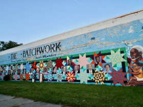 Ras' Ammar Nsoroma's 'Patchwork' mural on North Avenue, which was originally painted 1991, with the lower portion being refreshed in 2012