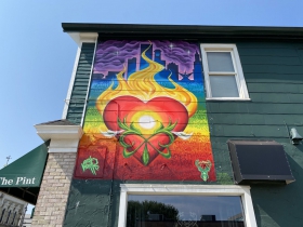 A mural by Aisha Valentin at 818 S. 2nd St.