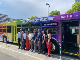Officials at unveiling of 2023 MCTS Pride bus