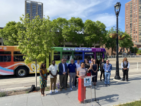 Officials at unveiling of 2023 MCTS Pride bus