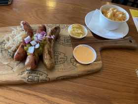 Sausage flight and Mac and cheese