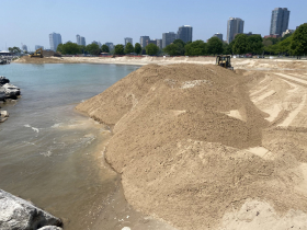 The sand is closing gap between breakwater and beach