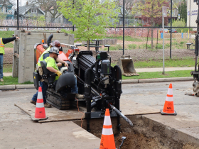 Construction crew replaces lead service line