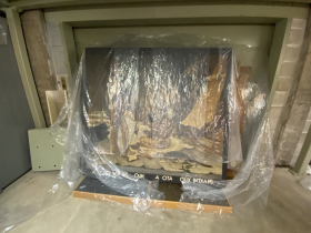 A damaged mural in a collections storage room in a sub-basement at the Milwaukee Public Museum