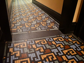 Original tiles in the foreground compared with new tiles