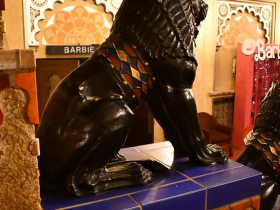 The blue tiled base of the glazed ceramic lion statues are in fact one piece