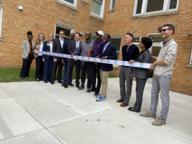 Ribbon cutting for Phoenix Residential Apartments. Anthony Kazee (center) next to Milwaukee County Executive David Crowley.