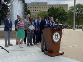 County Executive David Crowley speaks at Pride flag raising