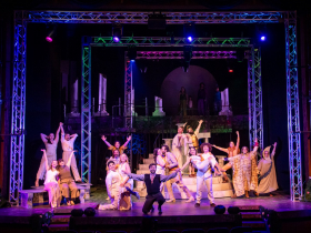 Center: Zach Thomas Woods (Peter Quince) and cast in Skylight Music Theatre’s production of A ROCKIN’ Midsummer Night’s Dream running April 10 through 26, 2026