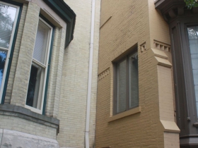 The Spite House, on left, blocks the southern exposure of its neighbor.