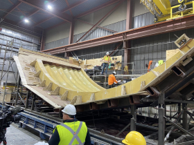 Exterior panel for future museum sitting in a cradle for transport