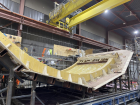 Exterior panel for future museum sitting in a cradle for transport