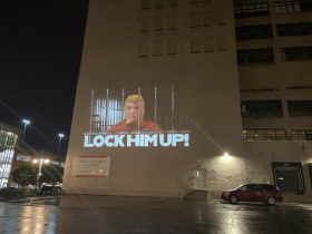 Anti-Trump media projected on Phoenix Building