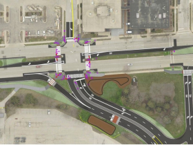 Reconfigured entrance and exit at intersection of N. 99th Street and W. Bluemound Rd.