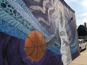 Giannis Antetokounmpo mural by Fred Kaems located at 3600 S. Clement Ave.