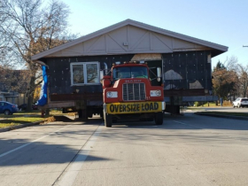 House Move Along S. Howell Ave.
