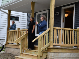 Janae Terry (center) at 2026 NextGen Homes Bus Tour