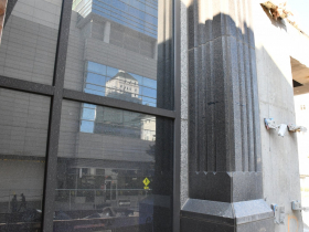 Final Piece of 1990 Granite Facade at NM North Building