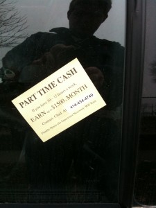 The soon-to-be-litter ad on a car window on the East Side.
