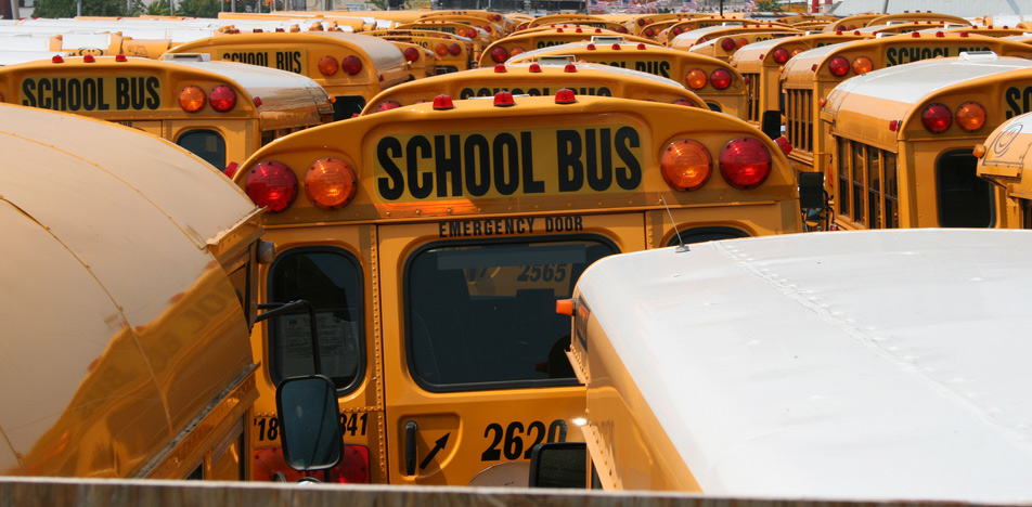 School Buses. Photo by Jan-Erik Finnberg. Image trimmed (CC BY 2.0).