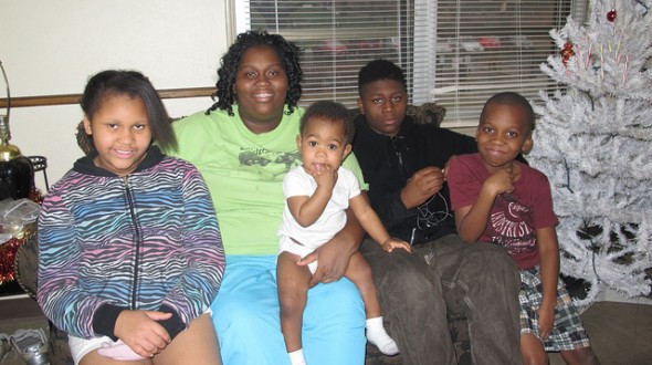 Marion Davis (middle), 29-year-old mother of four with her children: Marshae, 9; Marshawn, 1; Isaiah, 13; and Ydell, 7.