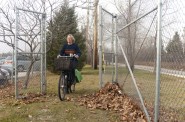 The connection to the trail is not paved (yet?), but you don't have to ride over much grass to get in.