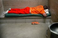 An inmate in the La Crosse County men's jail in 2006 has little to do but rest in his cell in a jail-issued uniform. Peter Thomson/La Crosse Tribune