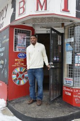 Charles Robinson Jr. stands in front of the storefront being remodeled to house the Borchert Field C.A.R.E.S. Resource Center. (Photo by Sue Vliet)