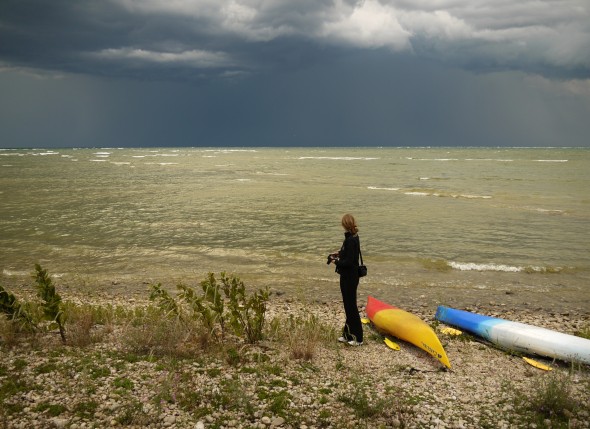 Concerns are growing about endocrine-disrupting chemicals in the Great Lakes and other surface waters. While eating too much contaminated fish is risky, none of the experts advised avoiding swimming. Lake Michigan, August 2012. Andy Hall/Wisconsin Center for Investigative Journalism