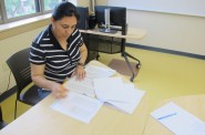 Fatima Lara, who’s taking GED prep classes at Journey House, is trying to complete her GED exams before the test changes. (Photo by Edgar Mendez)