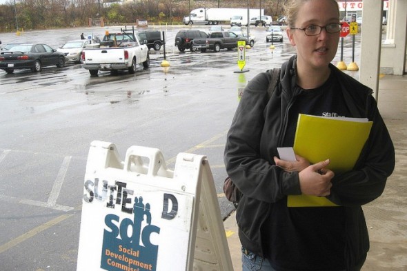 Kristina Smith, 27, arrives at the Social Development Commission office on Chase Avenue to apply for the Wisconsin Home Energy Assistance Program. (Photo by Brendan O’Brien)