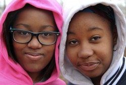 Sixth-graders Imya Patterson (left) and Aniaya Carter (right) participated in Saturday’s march to stop violence in the city. Patterson lost a 14-year-old cousin to gun violence in a shooting last summer. (Photo by Karen Slattery)