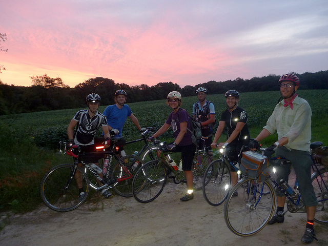 Some of the riders pause for a photo on the Pick Me Up at the Border Ride. By Michael Lemberger. Smile, your legal now!